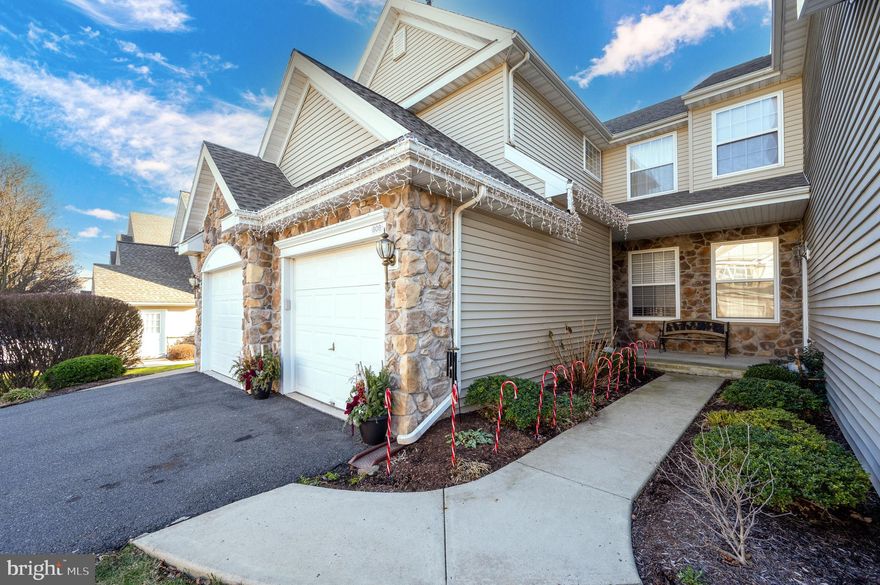 Job relocation is the only reason these sellers are leaving this beautiful, move in ready property! Easy living at its finest in the gorgeous Country Meadows, Twin Valley School District! This 2-bedroom, 2 full bathroom condo truly has everything you need. From the one car, built-in, front entry garage, to the vaulted ceilings and beautiful gas fireplace in the family room, it will not leave you wanting more. Enter into the front door off of the covered front porch into the foyer/mudroom area with two large coat closets and the entry door to the built-in garage. Make your way upstairs to discover a spacious, open layout featuring a 20-handle kitchen with breakfast bar for 3, gas stove, large pantry, double stainless-steel sink, and gorgeous new luxury vinyl plank. The kitchen opens up to the vast dining room with vaulted ceiling, recessed lighting, and door to the wooden, second story deck. The master suite is just off of the dining room and offers a large walk-in closet, plush carpeting, ceiling fan, and its very own private master bath with double sink, walk-in shower, and heat lamps! A second bedroom can be found just past a large storage closet and the laundry area. This bedroom additionally offers plush carpeting and recessed lighting as well as a spacious closet. The second full bathroom provides tile flooring and a modern feel with updated lighting, mirror, and floating shelves! The family room completes this cozy space and offers two cut-outs to the stair set, vaulted ceilings with ceiling fan, a gas fireplace with mantle, recessed lighting, and skylights! Aside from overflow parking for guests, a community pool and playground are more special treats that this incredible community has to offer. Gas heat and gas hot water make this condominium extra efficient. You will surely fall in love with this move in ready space. Call today for your private showing!