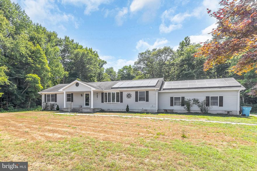 Welcome to your dream home! This stunning 2,132 sqft rancher, nestled on over 5 acres of serene and secluded land, offers the perfect blend of comfort and tranquility.

As you step inside, you'll be greeted by an inviting and spacious layout featuring three generous bedrooms and two full bathrooms, all conveniently situated on one level. The home boasts two distinct living areas, providing ample space for relaxation and entertainment. The cozy wood-burning fireplace adds warmth and charm, perfect for those chilly evenings.

The formal dining room is ideal for hosting family dinners and special occasions, while the large, partially screened-in rear deck offers a fantastic space for outdoor living. Overlooking the expansive backyard, this deck is the perfect spot for morning coffee, evening gatherings, or simply enjoying the natural beauty that surrounds you.

With a two-car garage and plenty of open space, this property provides the peace and privacy you've been searching for.  A large workshop is located in the backyard, offering endless possibilities for projects and hobbies.

Don't miss out on the opportunity to own this beautiful rancher that combines comfort, space, and tranquility. Schedule your private tour today and experience all this home has to offer!