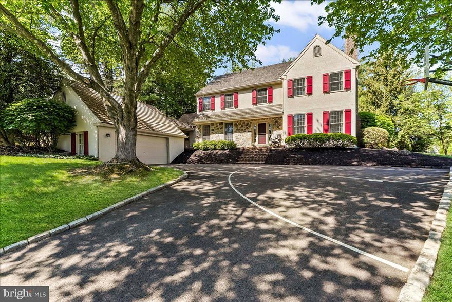 Welcome to 860 Springbank Lane – a distinguished home in the prestigious Avonwood neighborhood. Situated on a beautifully manicured corner lot, this classic four-bedroom, three-bathroom residence offers the perfect blend of space, functionality, and natural light.

Step into a bright and inviting foyer featuring a spiral staircase. The kitchen opens to an oversized family room, where skylights fill the space with warmth and daylight. This room also includes a gas fireplace and is surrounded by windows, creating an airy, open atmosphere. From here, double sliding doors lead to the back patio.

The main level also includes a formal living area with a wood-burning fireplace, an elegant dining room, a dedicated office, a powder room, and a convenient laundry room ideal for today’s lifestyles.

The spacious primary suite is a true retreat, boasting two large walk-in closets and a luxurious private bath with soaking tub.

Outside, enjoy gatherings on the patio or shoot hoops on your own driveway basketball court all within a generous backyard setting perfect for both relaxation and play. With an expansive unfinished basement ready for your vision, 860 Springbank Lane offers both immediate comfort and long-term potential in one of the area’s most sought-after communities.