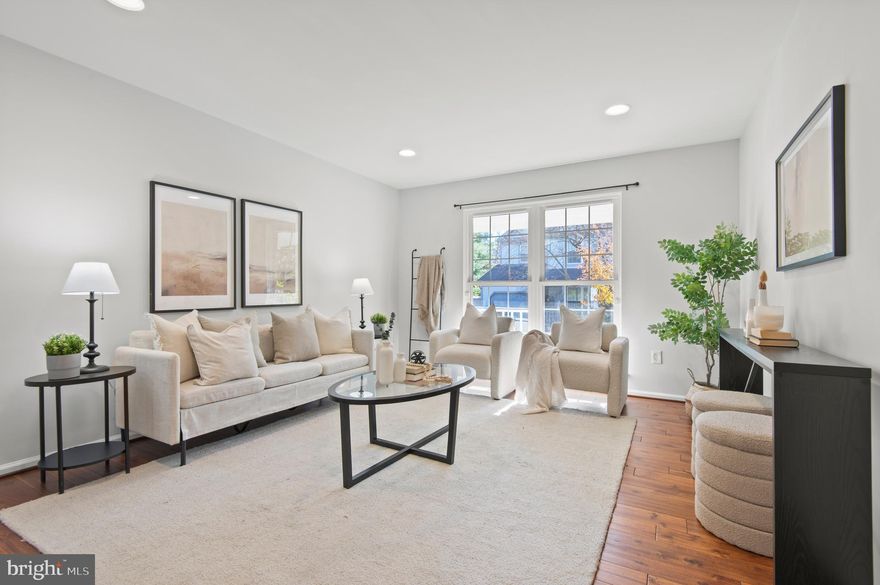 Open House canceled. Just staged! Motivated sellers! Welcome to your private sanctuary tucked just off W. Seminary Avenue: a charming, porch-front gem where tranquility meets elegance. Nestled at the edge of 4 acres of open fields and lush parkland, this home offers a rare sense of seclusion and connection to nature — all while being within reach of Blue Ribbon schools, amenities, and vibrant community life.

Step inside to discover a sun-lit kitchen boasting abundant cabinetry and graceful flow into the dining space. Every window frames views of mature trees, giving each room a serene feel.

Upstairs, three bedrooms and two full baths offer restful retreats. The finished basement is complete with a cozy wood-burning fireplace, ideal for movie nights, reading nooks or a game room. Recent mechanical and surface upgrades include a new heat pump in 2024; stove, dishwasher, upstairs carpet in 2025; wood floors in 2021.  The roof was replaced in 2017.

Outside, the expansive deck directly backs to open fields/parkland, you have unparalleled space for recreation, strolling or uninhibited play. The setting feels like your own private preserve, yet you’re minutes away from the conveniences of suburban life.