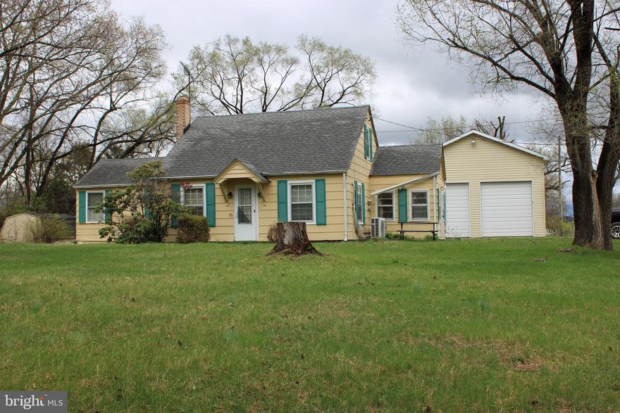 AN UPCOMING REAL ESTATE OFFERING FEATURING A 2-BEDROOM, 2-BATH HOME SITUATED ON A DOUBLE LOT IN BUNKER HIL, ALONG ROUTE 11 NORTH (WINCHESTER AVENUE). THIS PROPERTY IS CONVENIENTLY LOCATED NEAR I-81, INWOOD, WV, AND WINCHESTER, VA.

KEY FEATURES OF THE ESTATE INCLUDE:

-WORKSHOP & STORAGE: A LARGE 2-BAY SHOP (APPROXIMATELY 30’ X 30’) WITH 10' GARAGE DOORS, 16’ CEILINGS, AND A SEPARATE 200-AMP SERVICE. THE PROPERTY ALSO INCLUDES A BARN-STYLE OUTBUILDING.

-THE RESIDENCE: THE HOME FEATURES A NEWER ROOF (APPROX. 2-3 YEARS OLD), TWO MR. COOL UNITS, AND PROPANE HEAT. WHILE THE INTERIOR REQUIRES SOME TLC, IT OFFERS ENDLESS POSSIBILITIES AS AN OFFICE, RENTAL PROPERTY, OR A CUSTOMIZED PRIMARY RESIDENCE OR BUSINESS.

-UTILITIES: THE PROPERTY IS SERVICES BY PUBLIC WATER AND SEWER.

THIS LOCATION OFFERS EXCELLENT POTENTIAL FOR THE RIGHT BUYER. PLEASE CONTACT US FOR MORE INFORMATION REGARDING THE AUCTION PROCESS.