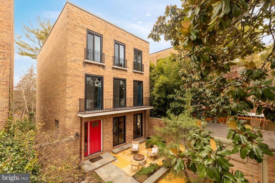 Price improvement! Tucked away in the heart of Cleveland Park, 3541 Ordway St NW encompasses contemporary design, seamlessly blending modern elegance with nature’s tranquility. This residence offers four levels of sun-drenched interiors with an elevator, private outdoor retreats, and all the amenities of the Cleveland Park neighborhood. 

Step through the gated front courtyard, where a serene koi pond, outdoor kitchen, and lush sitting area set the tone for indoor-outdoor living at its finest. Walls of floor-to-ceiling windows and glass doors blur the lines between inside and out, filling every corner of this 4,600-square-foot home with natural light. At the heart of the home, the expansive contemporary kitchen features a peninsula island, premium appliances, wine storage, and a walk-in pantry. Just beyond, the elegant dining area—framed by built-ins and a private balcony—invites intimate gatherings or dinner parties.

Ascend to the second level where a spacious living room is a sunlit retreat with a fireplace, wet bar, and private balcony. A versatile additional room on this level, with its own balcony and full bath, makes an ideal library, office, or study. The third level hosts three bedrooms and two full baths, including the primary suite, complete with two walk-in closets and an ensuite bath.

On the lower level, a home office (or additional bedroom) with built-ins and a full bath offers flexibility. A few steps down, another stunning living space with a fireplace creates a cozy retreat, opening to the private fenced backyard with a second koi pond, tons of trees, and lush landscaping.

With a private elevator connecting all four floors, multiple balconies, and exquisitely landscaped outdoor spaces, this one-of-a-kind contemporary gem offers unparalleled luxury, privacy, and convenience. Welcome home to a lifestyle of elegance and ease in the Nation’s Capital.