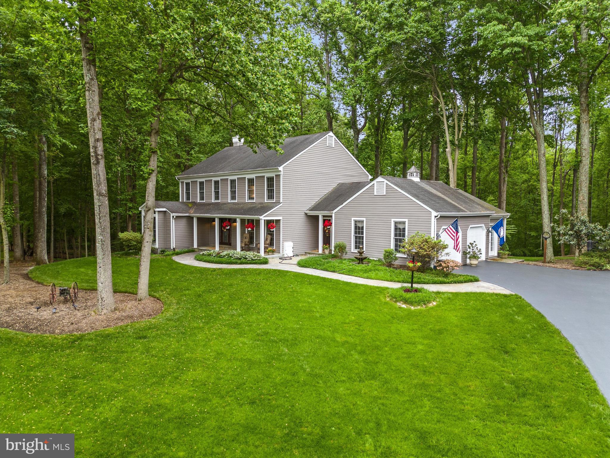 Nestled on a spacious 1.65-acre lot in Fairfax Station, this stunning 4-bedroom, 3.5-bathroom home will captivate you from the moment you arrive. A manicured lawn (and freshly mulched), mature trees, and an inviting front porch welcome you into a space that has been meticulously transformed (2017) by its owners.
Step inside to discover a world of elegance and charm, with custom hand-painted murals and unique touches at every turn. The main level boasts multiple living areas, including a great room, sunroom, formal dining room, office space, and a well-appointed kitchen with a cozy sitting area.
Upstairs, a serene primary suite awaits, complete with an updated ensuite bathroom. Three additional bedrooms and a full hall bathroom offer ample space for guests or family members.
Venture downstairs to the basement to find even more living and entertaining space, including a third full bathroom, a large laundry room, and a bonus room perfect for hobbies or relaxation. The expansive workshop area is a haven for DIY enthusiasts, providing ample space for woodworking, crafting, or simply unwinding after a long day.
Outside, the entertainment options are endless, with a lush backyard offering the perfect backdrop for outdoor gatherings. The custom-built pirate ship playground is sure to delight children and adults alike, with its crow's nest, cannons, ship wheel, dinghy, slide, and even electricity! Additional features include an extra storage building with electricity and a poured pad for added convenience.
With its luxurious amenities, abundant living space, and unparalleled outdoor entertainment options, this Fairfax Station home is a true oasis for modern living.