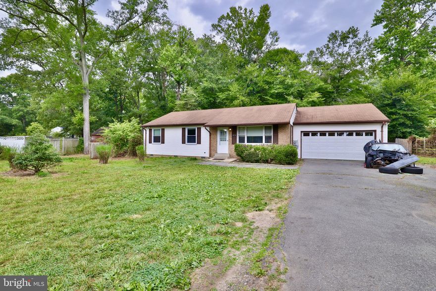 One level living at its' finest. Home features new carpet (2023), updated master bath (2023), stainless steel appliances (2023), new garage door (2023), and a new hot water tank (2022). Home has a screened in porch off the dining room and a huge backyard for entertaining. Home is mins to MGM and the National Harbor, the 495 beltway, and Old Town Alexandria. Motivated sellers won't last long.