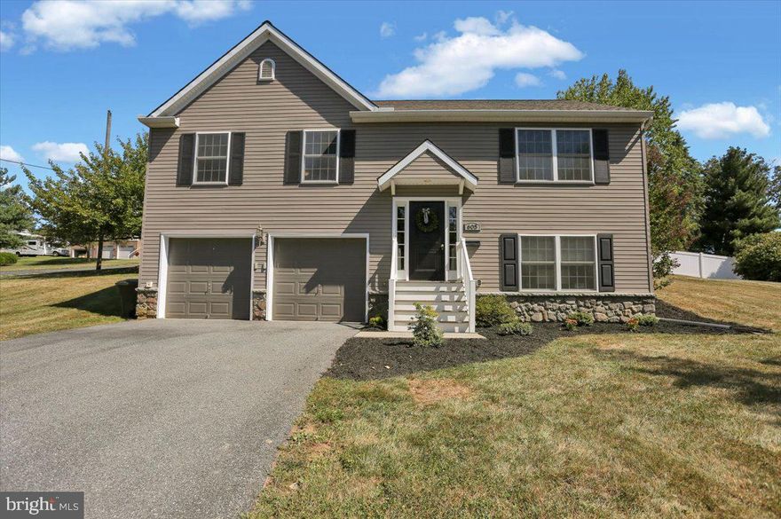 Welcome to 605 Terrace Avenue! This bright, updated home is located on a quiet street in Mount Joy and is ready for you to move right in! This home has a split foyer entry with easy access to both levels of the home. On the main floor, you will find an open living/kitchen/dining area with vaulted ceilings and beautiful engineered hardwood flooring throughout. Also located on this floor are three spacious bedrooms and two full bathrooms. There is plenty of closet space to be had, including a walk-in closet in the master bedroom. Moving downstairs, the large finished area includes a den/family room space as well as another large, finished room which could be used as an office or guest room as well as a half bath and laundry room. As an added bonus, the lower level rooms have just received new floor coverings, paint and finishes.  From this level you will also enter your spacious 2-car garage with extra space for a workbench and storage. Moving outside, you will enjoy the large, corner lot and a deck that you can step onto right from your kitchen. All appliances are included for your convenience. This home boasts an economical heat pump/central air system and is only eight years old.  Schedule your showing quickly and enjoy the holidays in your new home. This is truly a gem that you won't want to miss!