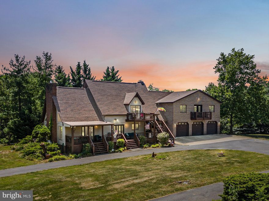 BACK TO ACTIVE THROUGH NO FAULT OF HOME OR SELLER.  NO INSPECTIONS MADE.  This charming and unique custom-built home, nestled on a secluded, park-like 2.67 acres, will enchant you with its towering, vaulted ceilings, hardwood floors, and newly renovated kitchen that has marble countertops, stainless steel appliances, soft-close cabinetry, and ceramic tile flooring. The dining area is located off the kitchen, and it opens into the large living room that features vaulted ceilings, exposed beams, lots of windows, and a gas fireplace with a new insert. The laundry room with a new washer and dryer is on this level between the kitchen and attached, over-sized 3-car garage. This main floor is finished off with a full bathroom and a bedroom with its own fireplace. There are two more exceptionally large bedrooms with vaulted ceilings, en suite bathrooms, and balconies upstairs, along with a loft area for relaxation. There is also a spacious walk-in closet and a window seat with storage in the enormous owner's suite. And to top it off, there is a private entrance from the ground floor to this room. This unique home features some custom lighting and built-in bookshelves.  It also has a detached 2-car garage with a bonus room currently set up as a bar (Custom-built bar & stools convey if you wish) equipped with heating and cooling to relax in after enjoying time in the NEW 28’ above ground POOL with deck. With an area for horseshoes and a badminton court, this is truly an entertainer's dream come true! This property is very private and is fully fenced with a gate to close off the driveway if desired and has a walking trail around the perimeter. Newer features include dual-zoned Trane heat pumps, roof and septic 2019; kitchen, gas fireplace insert, hot water heater, and above ground pool 2023. All this is just minutes from I-81, Route 9, and city amenities.  If you are tired of cookie-cutter homes, this is the one for you!