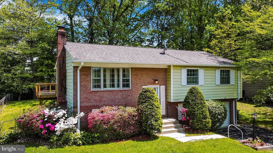 New floors throughout the house with 4 bedrooms and 3 full bathrooms. New washer & Dryer 2024.  The large, attached deck was replaced in late 2024 and overlooks a fenced backyard.  Great setting for outdoor gatherings. Conveniently located near commuter routes and family-friendly amenities, this home ensures easy access to everything you need. Easy access to military bases and commuter parking.  Plenty of garage, driveway and street parking available.  Stuart M. Beville Middle School is 11 minutes walk (1/2 mile).  Costco, Walmart Superstore and Potomac Mills Shopping is 5 miles away.