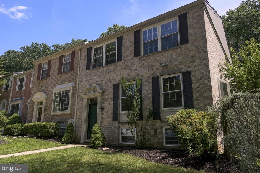 One of the largest models (3000+ sq ft) in the NBHD this 3 level all brick EOG townhome  has it all!! Open layout & light-filled living spaces; remodeled  kitchen, SS appliances, 42" cabinets & desk area; LR w/ access to deck that backs to parkland & trees. Master bedroom with dual walk-in closets & rec. remodeled  spa-like bath. LL fam rm  w FP; 4th BD; Full Bath & Walkout to private fenced yard.