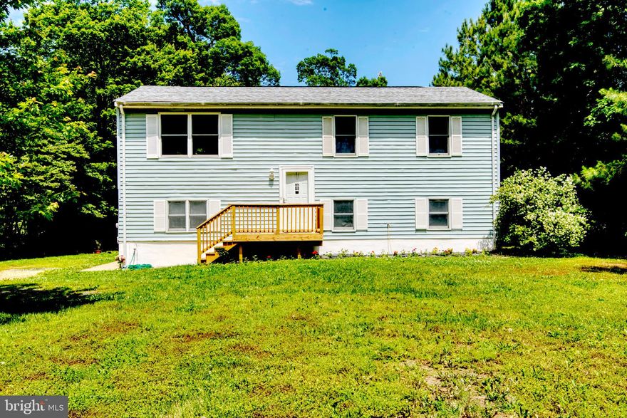 The Price is Right and no HOA.  Find out how you can buy this home for less than the cost of paying rent. USDA 100% financing available for qualified buyer. This affordable home with classic floor plan features 4 bedrooms, 3 baths and sits on nearly 1 acre of land. Spacious eat-in kitchen with room for the whole family. New fresh paint and wall to wall carpeting on the main level. Lower level family room, workshop, bedroom, office/bedroom and storage area.  Love to garden and grow your own food? Lots of Organic Garden space. Rich, Fertile, Black Organic Soil for growing Nutrient-Dense Foods. Organic Spring Garden already planted and harvesting Peas, Kale, Lettuce, Spinach, Garlic and more! Organic Summer Garden ready to go, Tomatoes, Cucumbers and Sweet Peppers are just a start. Love fresh egg...then you will appreciate the existing Chicken Coop complete with skylights. Large shed for storing your outdoor equipment. Craftsman Riding Lawnmower included for FREE. Just in time for summer enjoyment.  Relax on the back deck or enjoy unlimited fun in the above ground swimming pool. Just a short distance to the nearby Farmers Market, NAS Patuxent River and Parks. Don't let someone else buy your home!