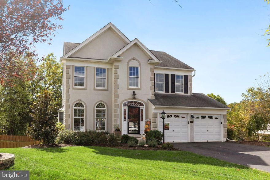 This beautiful home  in DVCC sits on a cul de sac lot backing to a wooded tree save area. Currently this home is a three bedroom but the masterbedroom  sitting area is easily turned back into a 4th  bedroom.  Open floor plan with three finished levels and a walk out basement. This home is loaded with natural light , high ceilings, crown molding and chair rail , large kitchen with Esik, Quartz counters  & tile backsplash, large master suite with his and her closets , awesome closet organizer in third bedroom,  wonderful LL with full walkout to paver patio, large full bath with rain shower,  gas zoned heating , gas cooking & hot water.  But it is the lot that will sell you on this home.  Beautiful composit deck with stairs to the paver patio below , fully fenced and very private.  Open Saturday 12-2.