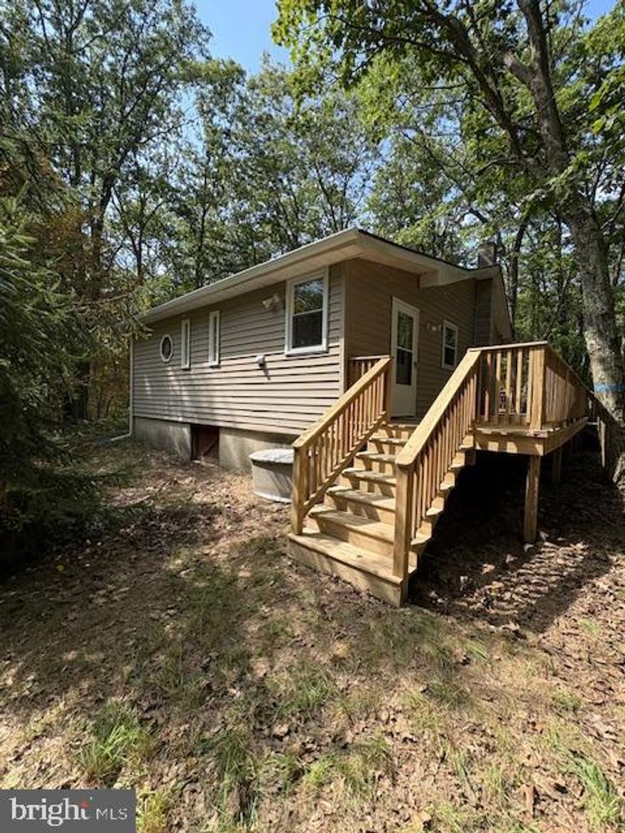 Fully Renovated Hunters’ Cabin – Move-In Ready!
 Escape to your own private woodland retreat! This fully renovated 1-bedroom, 1-bath cabin sits on 3.13 
acres in the Deer Lick Subdivision and is completely turnkey—move in and start enjoying the outdoors 
immediately. Perfectly located for hunters, the property offers direct walking access to nearby state land, 
giving you unparalleled opportunities for hunting, hiking, and wildlife observation.
 Inside, the cabin blends rustic charm with modern updates. Enjoy new flooring, fresh paint, modern 
fixtures, and upgraded utilities that make it comfortable year-round. The open layout maximizes space and 
light, creating a cozy, welcoming atmosphere for weekend getaways or extended stays. A propane heater 
keeps the cabin warm in the winter months, while air conditioning ensures comfort in summer.
 The exterior retains its classic cabin appeal with durable vinyl siding and a shingle roof. Surrounded by 
mature trees, the property offers privacy and a serene setting where you can disconnect from city life. It’s 
also ideal for outdoor enthusiasts who want quick access to state land without needing to drive anywhere.
 The cabin comes equipped with a refrigerator and washer and dryer, and is ready for immediate 
occupancy. Whether you’re looking for a peaceful retreat, a hunting base camp, or a cozy woodland 
getaway, this cabin delivers.
 Don’t miss the chance to own a ready-to-enjoy, fully updated cabin in a prime hunting location—your 
gateway to outdoor adventure and woodland serenity!