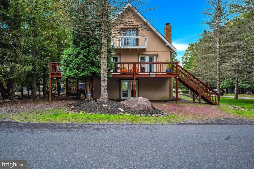 Envision this three-level Chalet home nestled within an amenity-rich community that caters to the needs of STR guests. This Chalet boasts an open floorplan featuring four spacious bedrooms and three full bathrooms. Commence your day with a refreshing cup of coffee on the wrap-around deck or from one of the two third-floor balconies. Recent renovations have enhanced the property’s roof, heating/cooling system, and hot water heaters. This corner property provides ample parking space for families and guests with its three driveways. In late 2021, an 8-person hot tub was installed to enhance the property’s recreational amenities. This vibrant community offers a wide range of attractions, including resort-style pools, lakes for paddle boating, tennis and basketball courts, playgrounds, a clubhouse and more! This property is conveniently located near the Mount Airy Casino, Kalahari Waterpark, Camelback Mountain, 
Tannersville Outlets, Great Wolf Lodge and other endless recreation the Poconos offers. Additionally, it is situated close to Routes 80 and 380. This property embodies the essence of the Poconos.