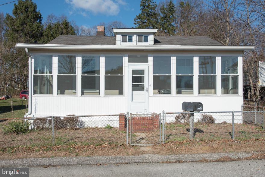 Annapolis location: 2 homes for the price of 1! The main home has newer windows & siding. Some hardwood floors under the carpet, gas heat, newer hot water heater. 2 driveways & income producing rental guest house w/ separate utilities. 3-season front porch, plenty of parking, large shed. Walk into town, close to West Street. Need appt. to show second house - tenant occupied.