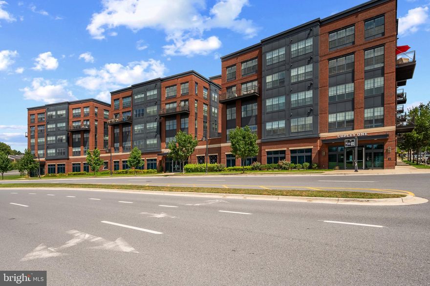 Fantastic Value!!!

Welcome to The Copley 2 at Downtown Crown!  

This IMMACULATE Two-Bedroom, 2 Bath plus Den in Copley 2 Shows like a New Unit! It was used as an office and never lived in as a primary residence. Copley 2 is the most sought after of Copley buildings as it is surrounded by courtyards and buildings on either side reducing the traffic and noise surrounding your unit. This condo perfectly blends luxury, convenience, and comfort. From the secure lobby with elevator access, to the rare courtyard-facing balcony, every detail is designed for modern living. Included are 2 premium parking spaces (86, 87)  and 2 storage unit across the hall, and custom electronic blinds.

Inside, wide-plank hardwood floors lead to an open-concept kitchen, dining, and living area with soaring ceilings and floor-to-ceiling windows. The chef’s kitchen features soft-close cabinetry with deep storage, quartz countertops, and stainless steel appliances. A versatile den with barn door and recessed lighting makes the perfect home office.

The spacious family room flows to a private balcony overlooking the landscaped courtyard—ideal for morning coffee or evening relaxation. The primary suite offers two custom walk-in closets and a spa-inspired bath with a dual-sink vanity, frameless walk-in shower, and laundry closet with high-efficiency washer/dryer. The second bedroom features oversized windows, a custom closet, and easy access to the full hall bath.
 
The Copley is a secure, well-maintained building with a low $445 monthly fee (including water). Residents may also opt into The Retreat amenities for $300/year, with access to a pool, tennis courts, bocce, playgrounds, and clubhouse.

All of this is just steps from Harris Teeter, Starbucks, Ruth’s Chris, Coastal Flats, Lifetime Fitness, Lululemon, and more, with nearby Rio offering additional dining, shopping, and entertainment. Commuting is effortless with quick access to I-270, I-370, and the ICC, plus a free shuttle to Shady Grove Metro.

Love where you live—this rare Copley gem truly has it all!