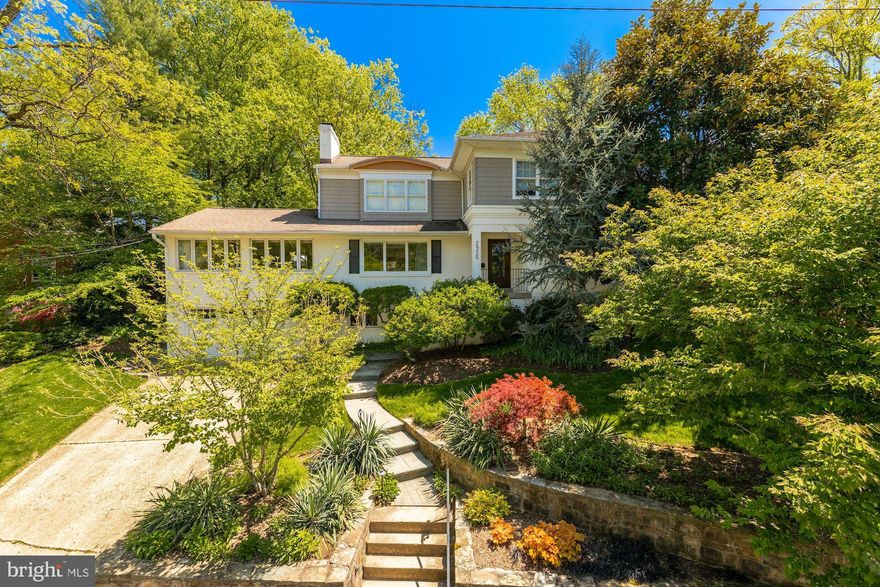 Sited on a quiet cul-de-sac in sought after Woodmont, this home has been thoughtfully renovated  and expanded. Featuring light-filled spaces, the main level offers a two-story foyer and a gourmet kitchen, with high-end appliances and Silestone countertops, that opens to the living room with a wood-burning fireplace. There is an  expansive family room offering cathedral ceilings and dining space, as well as a sunroom, two bedrooms and three full baths. The upper level offers a large primary bedroom suite with a dressing room/optional fifth bedroom, a walk-in closet and an en suite bath. An additional bedroom, full bath and laundry complete this level. The lower level features a recreation room with a fireplace, built-ins and a fish tank. There is a playroom, a bonus room, exercise room with additional laundry hookups, updated full bath and two storage rooms. Between the main and lower levels, there are many options for a home office. Outside, there is a large, grassy side yard and backyard patio spaces with lush landscaping and a water feature. It's a short walk to both Windy Run and Fort C.F. Smith parks, as well as Lyon Village Shopping Center. Only one light to DC and a quick drive to Alexandria and Tysons. Taylor/Hamm/Yorktown school pyramid.