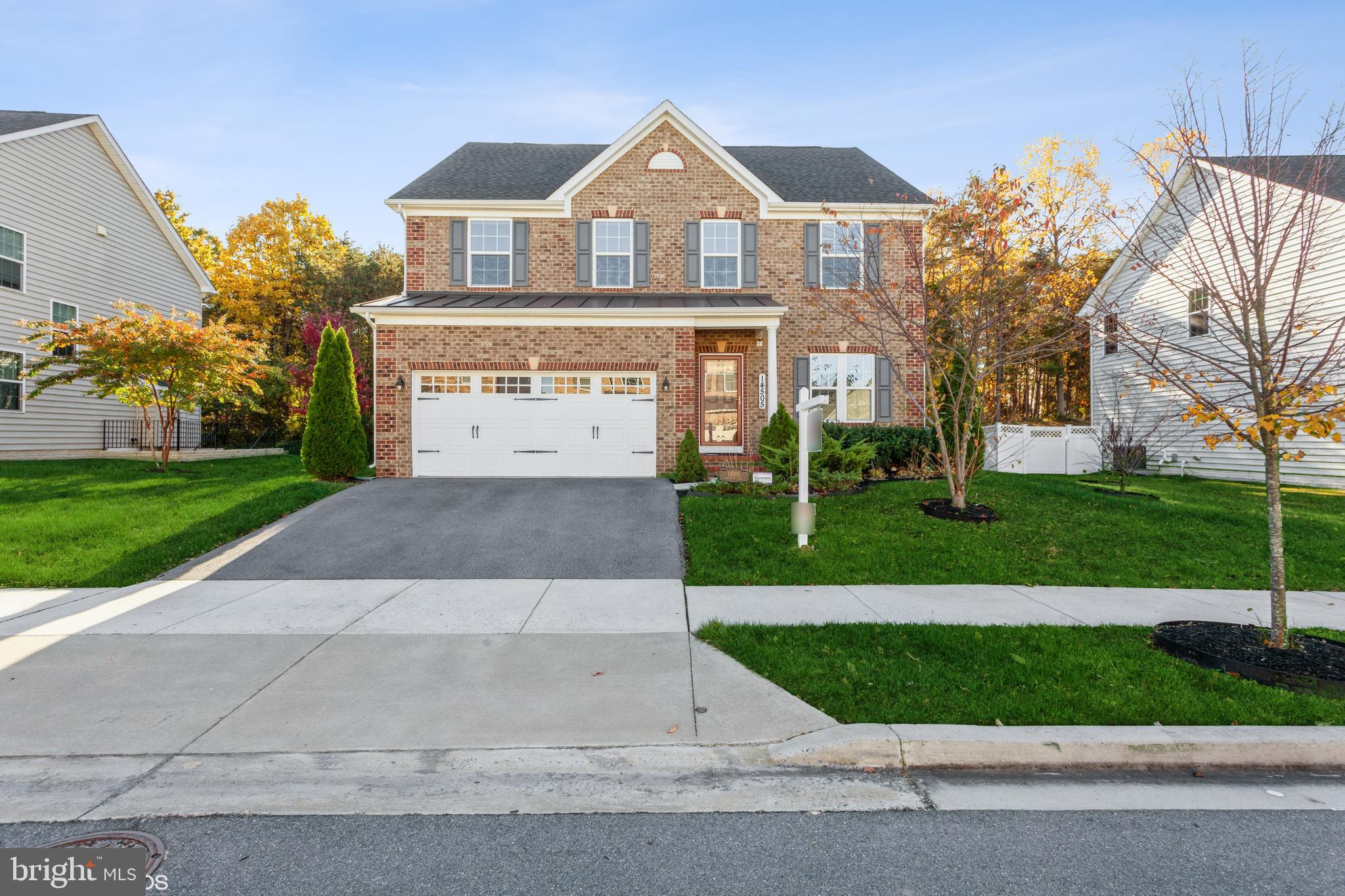 Welcome to the new built Bentley Park community. This 5 bedroom, 3.5 bathrooms, 2 car garage colonial single family home offers 3,652 total square feet of living space. The driveway offers space for an additional 2 car parking. As you enter the house onto the foyer, you are amazed by the hardwood floors throughout the main level. To the right, you are presented with a luxurious living room with decorative crown molding and recess lighting. Beyond the living room, is the gracious sized dining room also with crown molding and shadow boxes on the wall that gives a rich appearance. From the foyer, you can walk straight forward to the gourmet kitchen with all the bells and whistles you would expect from a luxury home. There are stainless steel appliances, granite countertops, as well as a kitchen island with granite countertops in the kitchen. There are beautiful expresso wood cabinets to match the dark hardwood floors and recess lighting. Next to the kitchen is a mud room that enters into the garage. Beyond the kitchen, on the way to the family room, you have sit in kitchen space for casual eating. The huge family room is open to the kitchen with a gas marble framed fireplace. Classic fireplace mantel gives the room a wonderful focal point. As you make your way to the upper level, you have 4 bedrooms. The master bedroom is unusually large with a sitting area, 2 walk in closets, and tray ceilings. The master bathroom is spectacular with his and her vanities, separate shower and soaking tub both with upgraded tiles. The other 3 bedrooms are a nice size and there is a full bathroom in the hallway. One of the great things about this house is that it has a separate laundry room on the upper level. The basement has great entertaining potential with the massive recreation room. You can imagine the parties you will want to have. There is also a bedroom in the basement and a full bathroom. Bonus bar and stools are included free of charge. House is prewired for a generator and water softener system. Custom patio with seating that backs to the woods gives you some extra privacy. The home is conveniently located on the border of Montgomery Co. Easy access to beltway to get to DC or Baltimore. Plenty of restaurants and shopping. Minutes away from Laurel Town Center, Aquatic Center, Baseball Park, Golf Course, and the new Katerra Project that will certainly make home values go up. THIS HOME HAS ALREADY BEEN RECENTLY APPRAISED AT $745,000. APPRAISAL CAN BE DOWNLOADED FROM MLS. DON'T MISS OUT!