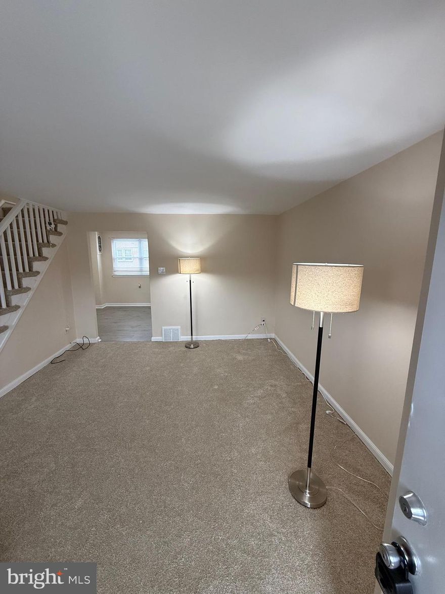 Nestled in the charming Philadelphia Northeast neighborhood, this exquisite AirLite townhouse exudes warmth and comfort, perfect for those seeking a refined yet inviting lifestyle. Built in 1950, this residence has been lovingly maintained, freshly painted and with new carpet and luxury vinyl plank flooring, showcasing its classic charm with modern convenience. Step inside to discover a thoughtfully designed interior featuring a blend of plush carpeting, luxury vinyl plank, and elegant ceramic tile flooring. The spacious layout encompasses two cozy bedrooms and a well-appointed full bathroom, ensuring ample space for relaxation and rejuvenation. The heart of the home is complemented by its appliances, including a sleek refrigerator and a convenient washer, making daily living effortless. Natural light pours in through double-hung replacement windows, creating a bright and airy atmosphere throughout. Outside, the property boasts a beautifully paved driveway leading to a rear-entry basement garage, providing both functionality and ease of access. The surrounding sidewalks invite leisurely strolls through the neighborhood, nearby shopping and restaurants within easy walking distance, enhancing the sense of community. Solis Cohen Elementary school is at the end of the block. With a modest lot size of 1280 sq ft, this residence offers a low-maintenance lifestyle, allowing you to focus on what truly matters. Enjoy the convenience of nearby public transportation, ensuring that the vibrant city life is always within reach. Experience the perfect blend of comfort, style, and convenience in this delightful townhouse, where every detail has been curated for an exclusive living experience. Perfect for homeowners or investors.