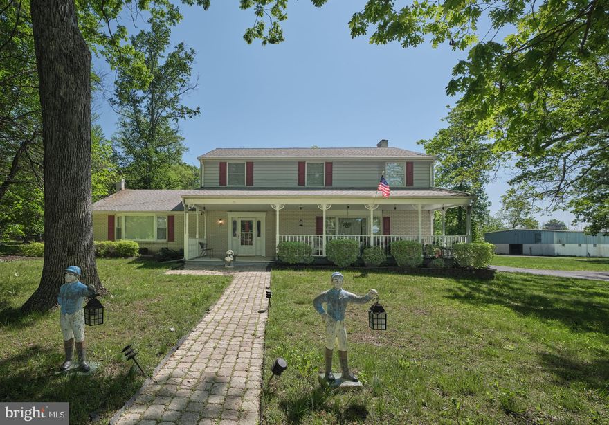 EXCEPTIONAL OPPORTUNITY TO OWN 30 ACRES IN BUCKINGHAM TOWNSHIP!!!  Welcome to 1581 Holicong Road! Nestled in the heart of scenic Buckingham Township, this stunning and secluded 30-acre property is a dream come true for the equestrian enthusiast. Ideally situated between the charming towns of Doylestown and New Hope, this unique estate offers privacy, functionality, and natural beauty in equal measure. At the heart of the property is a beautifully maintained 4-bedroom Colonial home, full of character and warmth. The main level features a formal dining room and a spacious living room adorned with rich hardwood floors. The kitchen is bright and inviting, offering newer appliances and a sunlit breakfast area with a large bay window overlooking the serene, private backyard. Open to the kitchen is a cozy family room with beamed ceilings and a wood-burning fireplace—perfect for gathering with friends and family. A convenient powder room and mudroom complete the main floor.Upstairs, the generous primary suite includes a private en-suite bath. Three additional bedrooms and a full hall bathroom provide comfortable space for family or guests. Equestrian facilities are exceptional: the property boasts two barns with haylofts, a tack room and a total of 12 stalls, 5 turnout sheds, 6 paddocks, and a large pole barn with 4 additional stalls and ample space for equipment storage. Expansive fenced pastures and open fields create a picturesque and practical setting for horses and outdoor living.Whether you're an avid rider, hobby farmer, or simply someone seeking peace, privacy, and space to explore, this remarkable property offers endless possibilities in a truly idyllic location. Subdividable lot possibilities.