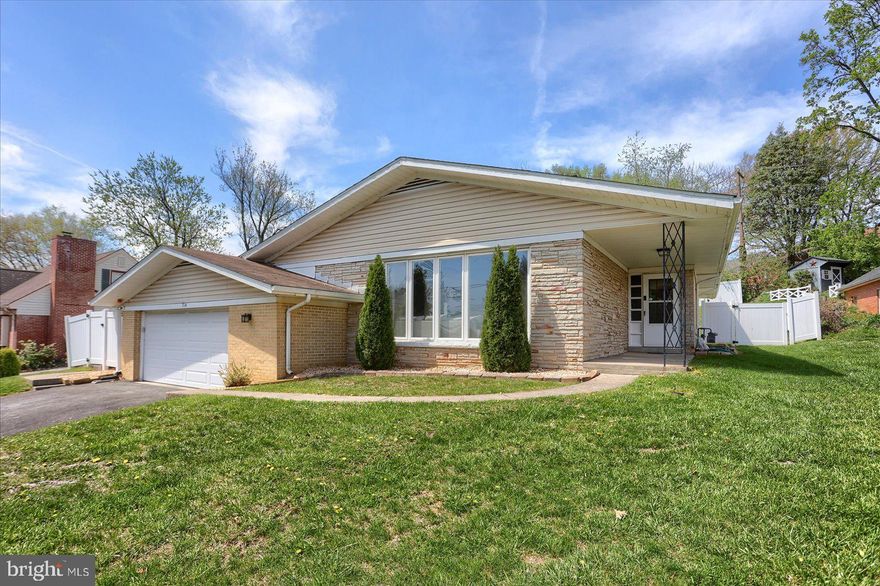Wow! This four bedroom mid-century modern rancher in York Suburban is ready for new owners. The finished basement offers tons of room for recreation with space for a fifth bedroom. There is a main bedroom suite, fenced-in-yard, and a stunning double-sided wood burning fireplace. This property is close to I-83, York College, York Hospital, shopping, dining, art, nightlife, and so many amenities.  The design of this home has the perfect flow to it and once you see the charm and character in person you won't want to leave.