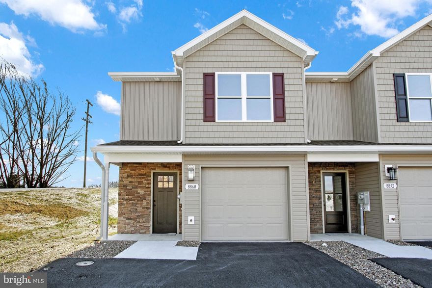 This is a brand-new end-unit townhome custom-built in a quiet neighborhood with scenic views of the beautiful Waynesboro countryside! The highly sought-after Farmspring Estates offers the convenience of a nearby community pool, clubhouse, playground, dog park, walking trails, shopping, restaurants and an abundance of local amenities. The spacious home features three bedrooms and two and a half baths. The stunning eat-in kitchen includes brand-new stainless-steel appliances and ample granite countertop space. The main level also includes a half bath and an open living and dining area ready for you to make it your own. The upper-level features two oversized bedrooms, a convenient laundry area, and a full bath off the hall. The primary suite includes its own adjacent full bath and large walk-in closet. Carpeting, luxury vinyl flooring, ceiling fans, recessed lighting, central air and heat, and a rear patio all add to the appeal of this home. The finished attached garage offers a place to park outside of the elements and plenty of extra storage space. The paved driveway creates space for extra parking. Expected to be ready by 1/1/2025. Contact us today!