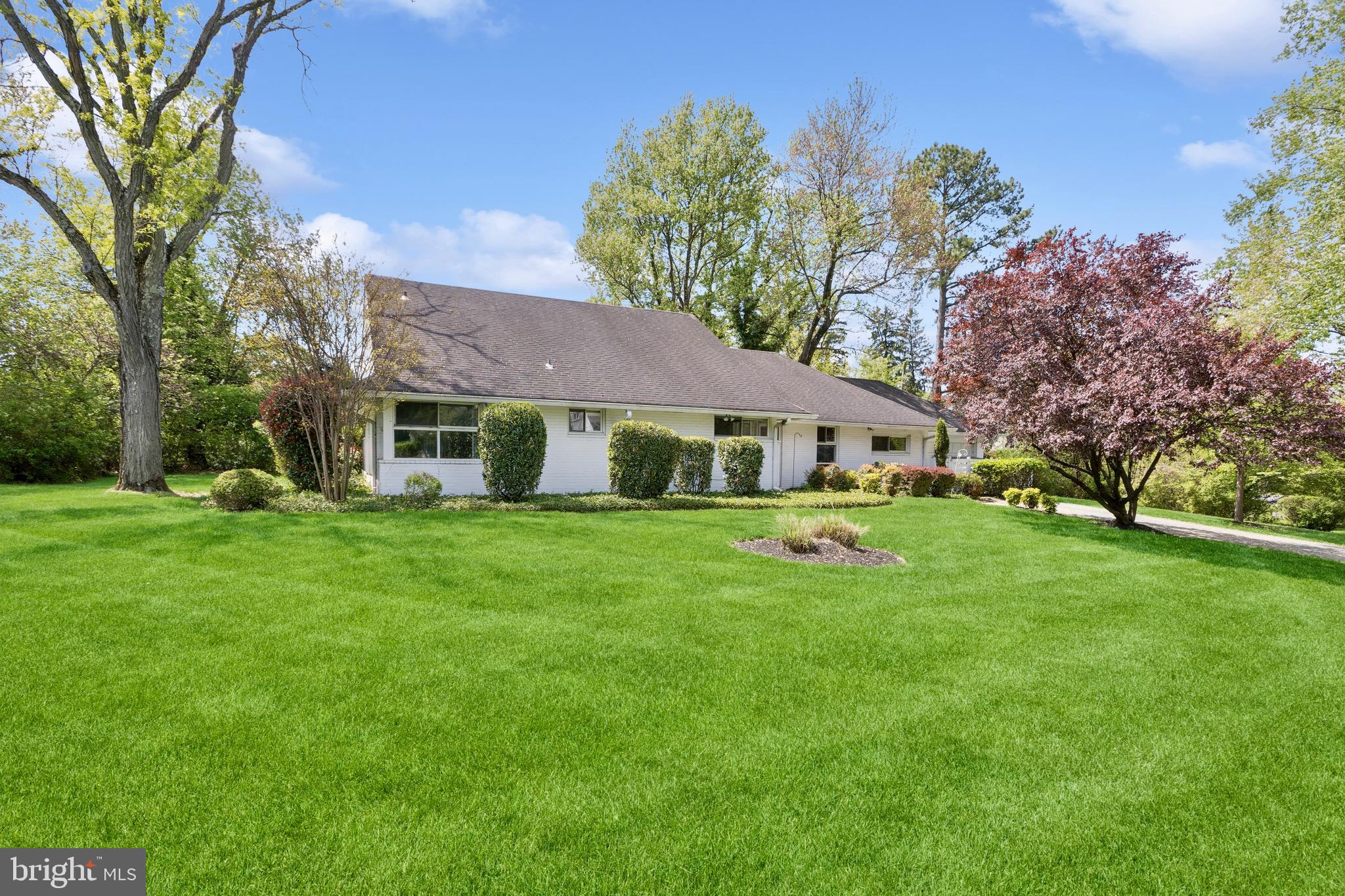 “A Mid-Century Modern Classic” Located on a quiet street in always sought-after Stevenson, come experience this charming SIX bedroom, 3-bath home. This striking painted brick residence has over 3,100 square feet of finished living space and offers numerous prized features including: a renovated Kitchen with stainless appliances including a double self-cleaning wall oven & a French door refrigerator, there are also granite tops with an under-mount sink, including a satin nickel instant hot and a built-in soap dispenser. The generously sized, adjoined Living and Dining Rooms are perfect for entertaining and feature a masonry fireplace that is surrounded on each side by a wonderfully bright wall of glass. The Family Rm is located off the Kitchen and it shows off vintage paneling, a classic wood built-in and track lighting. There are also two very useful walk-in storage closets off of the Family Rm. The Primary Bedroom suite is located on the first level along with three additional bedrooms and an updated Hall Bath. Rounding out the first floor, is a conveniently located washer & dryer. Head upstairs and you will find two more bedrooms. One of which features dual closets and is currently being used as an office. This very roomy space could easily be repurposed into a Den or Playroom, should you prefer. Finishing off the 2nd level is a full bath, a walk-in closet and two unfinished attic storage spaces. For extra peace of mind there is a security system and a Ring doorbell camera. For extra utility there are 2 additional freezers and an additional refrigerator. Outside there is much to enjoy on this peaceful corner lot, starting with a rear patio that can be entered from the Dining Rm. There is also a private backyard and two side yards to take advantage of. Don’t overlook the mature shrubbery and the storage shed as well. This prime location is very convenient to Quarry Lake, I-695, 83 and much more. Don’t let this one pass you by!