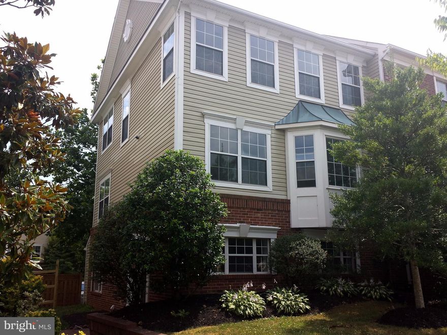 AVAILABLE NOW. Spacious and Light filled end unit with 4 bedrooms and 3 full baths.Rent includes front yard lawn service. Across the street from GW University. An abundance of Parking.