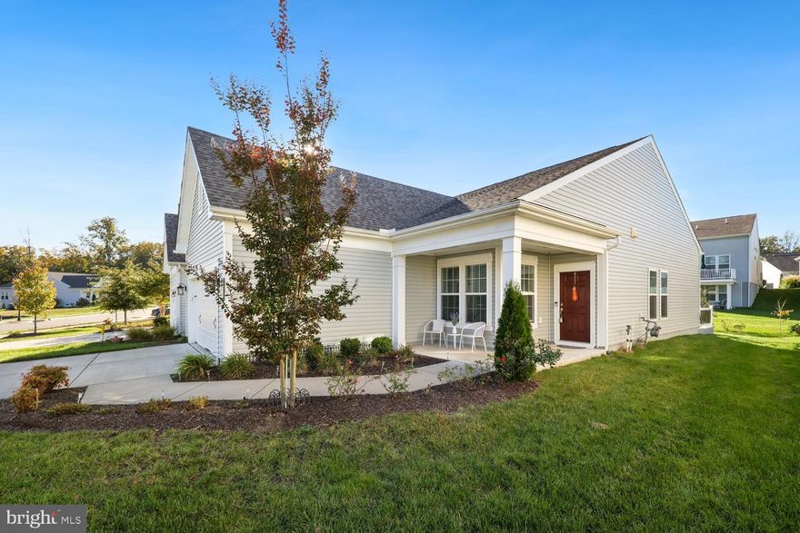 Welcome to your beautiful, immaculate new home! Located in Celebrate, the 55+ community with the fantastic clubhouse. Hardwood floors throughout, and a large, bright gourmet kitchen, with a marble island that conveys. Spacious open living room and dining area with a fireplace. An office or flex room too! The primary bedroom has a large walk-in closet and a spacious and elegant bathroom. The second bedroom is a cozy guest room with the second bathroom nearby.  Good size laundry room. This home is situated on a large premium lot. A nice, private front porch and a patio on the back with mature trees for outside enjoyment. A large two car garage and big driveway. All televisions and the computer monitor convey, except for the living room television. Built in 2021! It's time to start living the Celebrate VA experience lifecycle with tons of amenities!