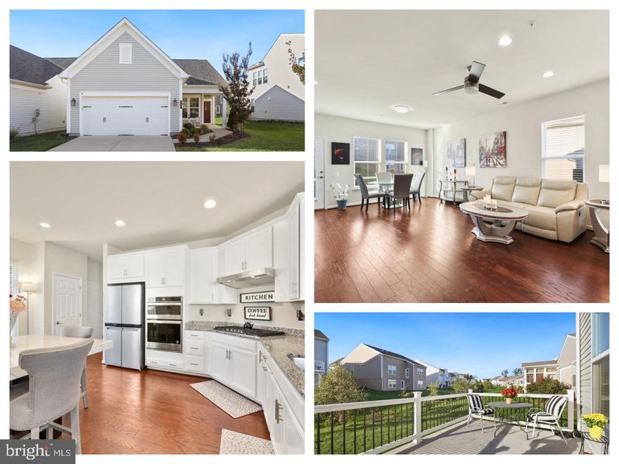 Welcome home to this immaculate, like-new residence in Celebrate, a premier 55+ community known for its exceptional clubhouse and amenities. This beautifully designed home features hardwood floors throughout and a bright, gourmet kitchen with a stunning marble island that conveys. The open-concept living and dining areas are spacious and inviting, highlighted by a cozy fireplace—perfect for both everyday living and entertaining.  A versatile office or flex room adds extra functionality. The primary suite offers a generous walk-in closet and an elegant, spa-like bathroom. A comfortable guest bedroom is conveniently located near the second full bathroom. You’ll also appreciate the well-sized laundry room. Situated on a premium lot, the home offers a charming, private front porch and a rear patio surrounded by mature trees—ideal for relaxing outdoors. Additional highlights include a two-car garage, an extended driveway, and the convenience of ALL televisions and a computer monitor conveying. Built in 2021, this home is move-in ready and offers the perfect opportunity to enjoy the Celebrate VA lifestyle, complete with abundant amenities and vibrant community living. Call for your tour today!