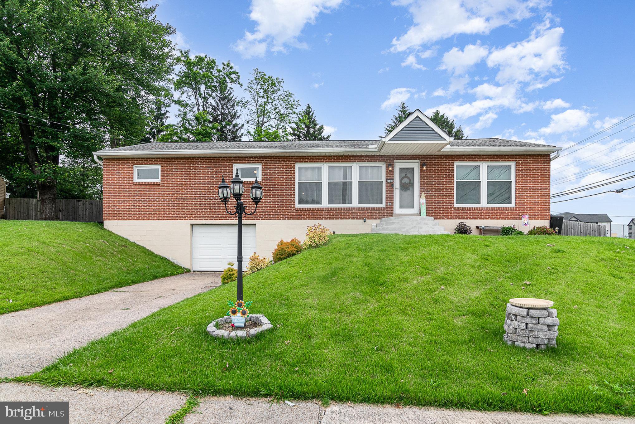 **Charming Remodeled Ranch in Prime Harrisburg Location!**
Just minutes from Route 81, this beautifully updated home blends character with modern comfort. Real hardwood floors and a cozy brick fireplace add warmth, while the tastefully remodeled kitchen with a separate dining area is perfect for daily living and entertaining. The primary bedroom features its own full bath, offering privacy and convenience, with an additional full bath for guests or other occupants. A spacious mudroom with built-in storage opens through sliding glass doors to a large, fully fenced backyard—ideal for relaxing or hosting. The finished basement adds even more flexible living space plus a dedicated laundry area. Move-in ready and full of thoughtful updates!