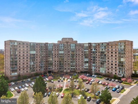 Photo of 19375 Cypress Ridge Terrace #322, LEESBURG, VA 20176 (MLS # VALO2130456)