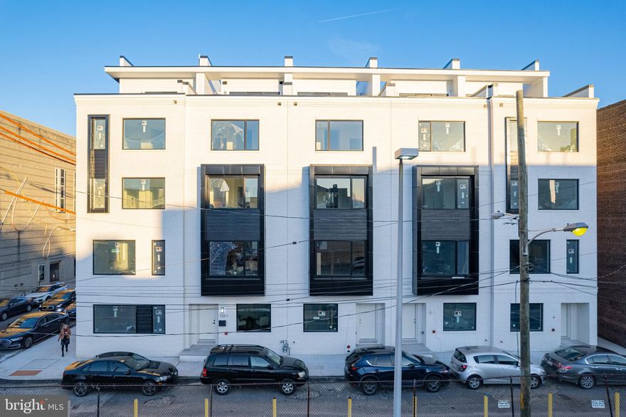 2- CAR PARKING IS OFFERED & NEW FINISHES AVAILABLE! Luxury Living at Lydian Place offers the quintessential city lifestyle. These ten exquisitely designed townhomes on the Avenue of the Arts create a unique urban experience to enjoy the rich cultural life of Center City Philadelphia.  With over 4,000 square feet of living space across 5 levels, each home features 4 spacious bedrooms, 4 full baths, and 2 half bathrooms, with a masterfully designed pilothouse, 2 decks, and a personal elevator! Step up from the light-filled foyer and atrium to the expansive open concept main level. Enjoy the comfortable living room with high ceilings, modern flooring throughout, and an ample dining area that flows into the gourmet chef kitchen. Luxurious yet functional, the kitchen features custom quartz countertops, and backsplash, with appliances from Subzero, Thermador, Bosch, and Wolf. The third floor is comprised of two large bedrooms with en-suite bathrooms, walk-in closets, and a full-sized laundry room. The impressive owner's bedroom is a regal 600 sq. ft and is the ultimate sanctuary occupying the entire fourth floor. The primary bathroom features a freestanding soaking tub, an oversized shower room of seamless glass, a private lavatory, and double vanity. Special attention has been given to the rooftop with a masterfully designed layout highlighting a spacious 375 sq. ft pilothouse complete with a custom wet bar and convenient powder room nestled between the two separate decks. This optimal space for entertaining offers spectacular panoramic views of the Philadelphia skyline. More home enjoyment comes with the fully finished lower-level family room or media room and includes a bedroom/office/exercise room and full bathroom. Each home offers garage parking with tons of extra room for storage, a top-of-the-line security system with one year of free monitoring services, and a multi-zoned energy-efficient HVAC system. The audio system includes five pairs of in-ceiling speakers, one pair of outdoor speakers.  Smart wiring infrastructure is installed for ultimate convenience and future upgrade possibilities with dual data (Cat6) and cable in every bedroom. Walk Score - 97 Transit Score - 100 Bike Score - 88. Conveniently located near Target, Sprouts Market, Whole Foods, Pet Smart, & PA Wine & Spirit Shop. Some homes are currently being built. Taxes estimated, 10 YEAR TAX ABATEMENT, some finish choices may vary, some features shown may vary slightly, Specifications, details, and finishes are subject to change.*PHOTOS ARE OF MODEL HOME* finishes and floor plans may vary.