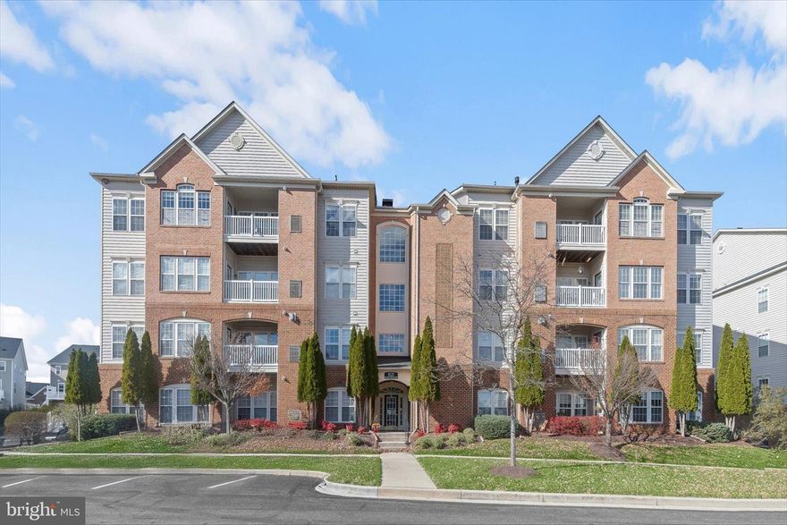 Welcome to 8125 Hickory High Court, Unit L an elegant condominium in the amenity-rich 55+ community of Hearthstone at Village Crest in Ellicott City. Abundant natural light and an open, airy floor plan create a truly impressive living space. The inviting living room flows seamlessly into the dining room, which is enhanced by classic moldings. The chef’s kitchen features ample cabinetry, granite countertops, a pantry, and a sunny breakfast room with direct access to the private balcony. The primary suite offers a serene retreat with a sitting area, walk-in closet, and a spa-like bath complete with a dual vanity, glass-enclosed shower, and linen closet. A second spacious bedroom, full bath, convenient laundry area, and generous storage round out the interior.
Residents of Hearthstone enjoy plentiful parking and exceptional amenities, including a clubhouse, pool, tennis courts, fitness center, and meeting spaces. Ideally located just minutes from downtown Ellicott City, US-29, MD-103, and the Long Gate Shopping Center, this home beautifully blends comfort, convenience, and a vibrant community lifestyle.

Some photos have been virtually staged.