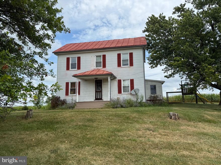 Welcome to 1309 Trevanion Road, a truly picturesque 40.73-acre farmstead in the rolling countryside of Carroll County, Maryland. This preserved agricultural property offers a rare opportunity for those seeking open space, income potential, or a peaceful rural retreat with easy access to Westminster, Taneytown, and Frederick.

The property features a classic early 1900s farmhouse—a traditional 3-bedroom, 2-bath Colonial/Farmhouse with country-style kitchen, dining room, living room, and covered porch. The home retains much of its original charm and layout but will require updating and repairs, providing the perfect canvas for restoration or modernization to suit your vision.

Beyond the residence, the land itself steals the show—a stunning mix of open, gently rolling fields, fenced pastures, and lightly wooded areas, ideal for horses, cattle, hay, or other agricultural uses. Existing farm structures include barns, run-in sheds, and storage buildings, supporting a variety of operations from livestock to hobby farming. The setting also offers potential for hunting, recreation, and scenic home expansion, all while protected by an agricultural land preservation easement.

With over 40 acres of usable ground, long road frontage, and beautiful views in every direction, this property combines timeless rural charm with endless potential. Bring your plans and make this one-of-a-kind farm your next investment or homestead.

Offered at $850,000 — a rare find for those who appreciate space, privacy, and natural beauty in the heart of Carroll County.