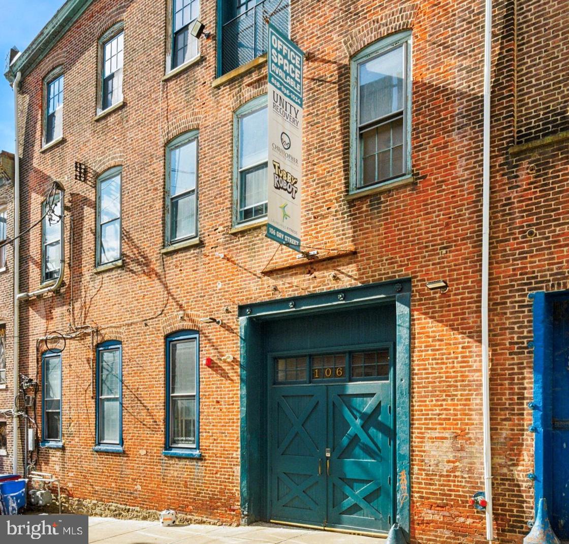 Discover the perfect blend of charm and functionality in this recently renovated building, now offering three unique units. Located just around the corner from the Manayunk train station & 76, this space is easy to get to for professionals seeking a serene and inspiring environment. The third floor features a quiet space with two bathrooms, a convenient kitchenette, and a shared conference room. The industrial setting boasts exposed beams and brick, accentuated by large windows that flood the space with natural light. These versatile spaces are perfect for therapists, sole practitioners, artists, authors, or anyone looking for a quiet place to work. This unit is equipped with a high-efficiency split system HVAC, ensuring comfort year-round. Electric is included. Don't miss out on this opportunity to kickstart your business or downsize into a comfortable location in Manayunk. The possibilities are endless!