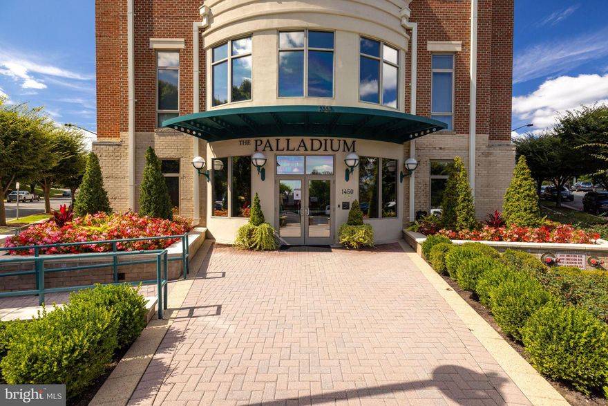 Finally.....a very large  beautiful unit is available in The Palladium, and it has a private elevator!!  Located in the heart of McLean, The Palladium offers an ideal and central location that is only a short walk to many of the restaurants, shops and markets that McLean has to offer.  Freshly painted and with a light-filled layout plus multiple outdoor spaces, this floor plan is great for both entertaining and day-to-day living. There is a formal entryway for guests leading to the large living room with a fireplace, access to a balcony and connecting to the dining room. The updated kitchen features white cabinetry, quartz countertops, a center island, ample storage and a breakfast nook. A hallway leads to a coat closet, a powder room and the private elevator with direct unit and parking access. The primary bedroom suite offers three closets, including a large walk-in closet, and an en suite bath with dual sinks, a jetted tub, a separate shower and a private water closet. There is an additional bedroom suite, a laundry closet and a den that provides access to the private terrace with a built-in planter. A large communal courtyard with seating and a barbecue is accessed directly from the patio. Additional Palladium amenities include an elaborate fitness center, a library and a staffed front desk. Two parking spaces and two storage spaces convey.
