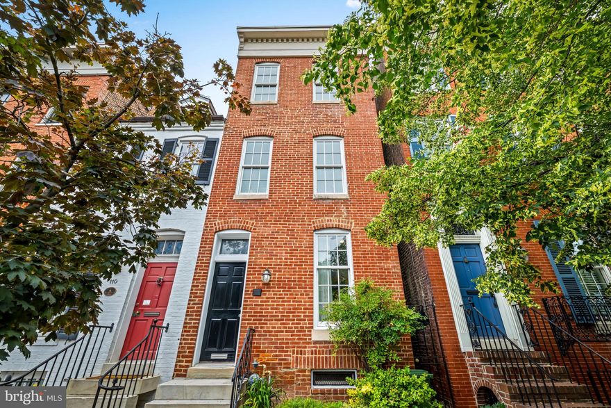 Set on a desirable stretch of East Montgomery Street in the heart of historic Federal Hill, 112 E. Montgomery Street offers classic brick rowhome charm, strong curb appeal, and an exceptional location. This 3-bedroom, 2.5-bath residence features a traditional layout with comfortable living space across three finished levels, wood floors, natural light, and spacious bedrooms. Outdoor highlights include a private rear patio and rooftop deck with an open rear outlook and attractive skyline views. Just steps from Federal Hill Park and convenient to downtown, Camden Station, MARC, stadiums, dining, and neighborhood attractions, this is a rare opportunity to own a well-positioned home in one of Baltimore’s most iconic neighborhoods.