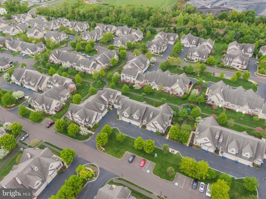 Fantastic, Meticulous Townhome, with a Fabulous Open Floor Plan in the Sought After Montgomery Walk 55+ Community, That is Only 12 Years Young!!! One Of the Largest Units in the Development with 2,213sqft, 2 Bedrooms, 2.5 Baths, Plus Sellers Turned the Large WalkIn Closet Upstairs Into a Home Office! Unfinished, Dry, Walkout Basement Adds an Additional 1,100+ Square Feet! Everything is Like New In This Townhome; Enjoy Maintenance Free Living as HOA Fee Includes Swimming Pool, Putting Green, Tennis Courts, Club House, Walking Path, Snow Removal, Lawn Care & Trash Removal! 
Also the Club House Has Many Activities Such as Workouts, Trips, Wine Club, Chess Club,  Gardening Club, Holiday Parties and Pool Aerobics; Also, a Women’s Group Goes Out to Lunch on a Regular Basis and a Men’s Group That Goes Out to Breakfast; Their Deck is Very Private and Overlooks the Walking Path; The Deck Has Be Extended, Now Double the Size of Other Decks in the Development and Has a Motorized Retractable Awning;  Walk Into the Foyer and Enjoy the Beautiful Hardwood Floors That Span Throughout the Entire First Floor; Living & Dining Room Combinations With Recessed Lighting, Vaulted 2 Story Ceiling, Huge Set Of Windows For Tons Of Natural Light, Hardwood Floors, & Convenient Powder Room; Totally Updated Kitchen, with Granite Counters, a Huge Island, Tons Of Counter and Cabinet Space, Stainless Steel Appliances, Tiled Back Splash and Recessed Lighting;  Breakfast Room with Vaulted Ceiling, Chandelier Lighting and Sliders to Private Back Deck!! Family Room Open To Kitchen with Vaulted Ceiling, Recessed Lighting and Gas Fireplace! Large First Floor Master Bedroom with Vaulted Ceilings, Overhead Lighting, a Huge Walk In Closet & Large Master Bath with Stall Shower, Soaking Tub, Dual Bowl Vanity, New Hardware and Lighting and a Ceramic Tile Floor; Second Bedroom Upstairs with a  Full Bathroom, a Home Office,  a Loft Overlooking First Floor;  Huge Walkout Basement Through Bilco Doors, Spans the Entire Footprint Of the House and Can Easily be Finished!!! Ping Pong table and Mini Pool Table Are Included; This Home Will Not Last!!!