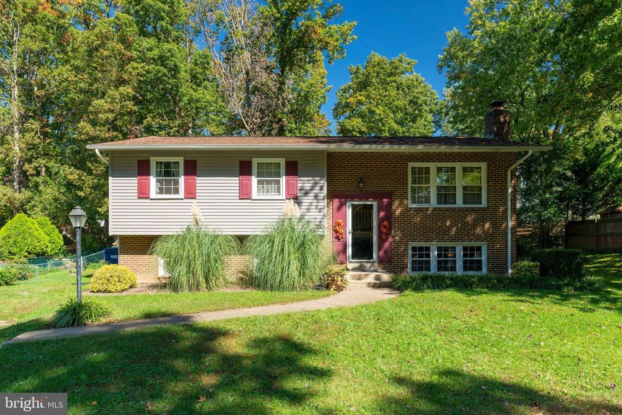 WOW! Nothing more needs to be said here...this home is the one! As soon as you step in the front door, you will feel the welcoming aura, with the gorgeous wood floors flowing throughout the entire main level, the neutral paint tones, and the open floor plan. The main level boasts a large, renovated kitchen, with stainless steel appliances and maple cabinets, a dining area, a living room, as well as three bedrooms and two full bathrooms. You will LOVE all of the big windows, with views out to the lush and green yard. Head to the lower level, with another large bedroom with attached, full bathroom. The amazing brick fireplace will have you dreaming of the fun gatherings you will have here snuggling by a warm fire. This area has so many options! An additional bedroom/office space and laundry room is also found on this level. When the weather warms up, you will enjoy the large deck that overlooks the flat and peaceful yard, with a shed that conveys. This home has been lovingly maintained by its current owners, with many updates occurring over the last few years. New roof and siding in 2017, new carpets in 2018, attic insulation upgraded to R30, newer HVAC and HWH. Don't miss out on this opportunity! Enjoy the walk through video! https://youtu.be/XDm70YfzvOQ