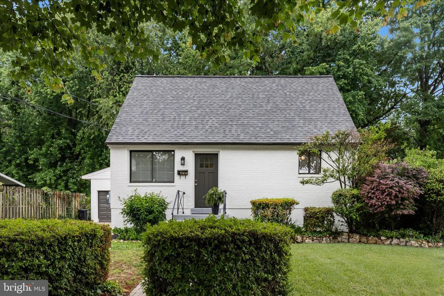 Welcome to this beautifully maintained 4BR/2BA Cape Cod in sought-after Randolph Hills — complete with the rare convenience of a two-car garage and exceptional curb appeal. The landscaped front yard creates a warm first impression, while the freshly painted interior features new flooring throughout and three finished levels of comfortable living space.

The flexible lower level includes a second full bath, laundry and utility area, plus walk-up access to the backyard — ideal for a recreation room, guest space, home office, or gym. The spacious table-space kitchen opens to a deck overlooking a stone patio and partially fenced backyard with mature landscaping, garden beds, and a seren treed view.

A long concrete driveway provides parking for multiple vehicles and leads to the oversized garage with an additional rear workshop/storage room — perfect for hobbyists, contractors, or anyone needing extra workspace and storage. Additional updates include replacement windows, gas heat and cooking and a recent roof and a gas water heater for added peace of mind.

Ideally located just minutes from shopping, dining, parks, and major commuter routes, and within walking distance to the Garrett Park MARC Train, this move-in ready home offers the perfect blend of charm, functionality, and convenience. - the perfect beginning to years of fun and enjoyment!