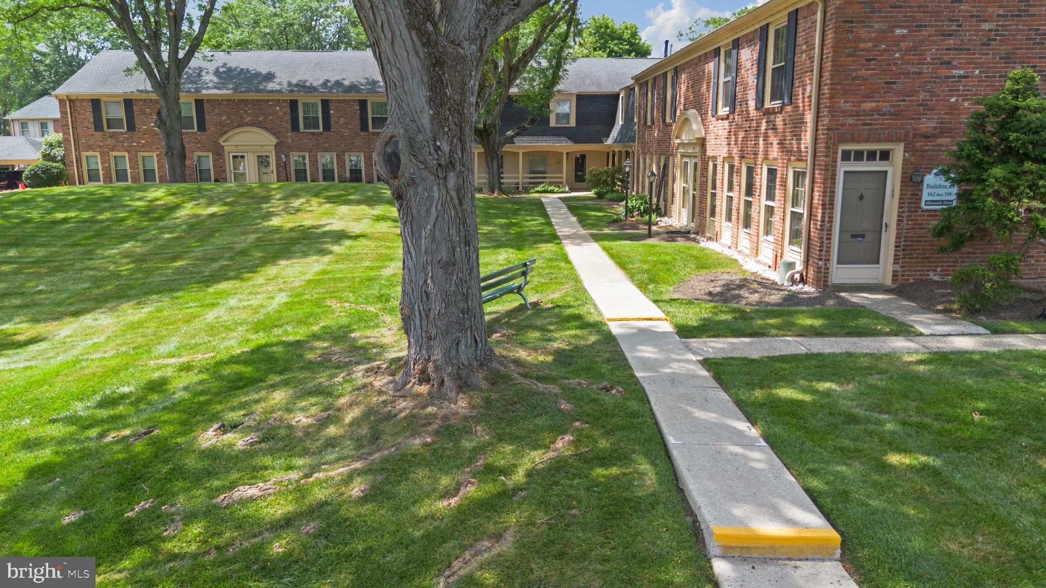 Welcome to this RARE find in Georgetown of Philadelphia in the desirable Wissahickon School District. 174 Albemarle is one of only 4 units like it in the community – a large, 2 bedroom, 2 full bath floorplan with all the perfect features you could want. Let’s start with BRAND NEW LVP flooring throughout the living and dining rooms, hallways, and both bedrooms. But that’s just the beginning. In 2023, the kitchen and both bathrooms were completely renovated with the help of a professional designer! The kitchen was taken down to the studs and all new electrical and plumbing were installed before new walls were put up. The kitchen is absolutely stunning with gorgeous soft-close maple cabinetry, sleek quartz countertops, large single bowl stainless under mount sink, gooseneck pull down faucet, subway tile backsplash, LVP tile flooring, breakfast bar with room for stools and a full wall of pantry-style cabinetry. Behind the kitchen is another feature you will only find in this rare floorplan – a full laundry room, complete with cabinets, shelving and countertop. The separate dining space off the kitchen has plenty of space for a large table and is wide open to the HUGE living room with sliding door to your large deck with steps to grade. Just beyond the living room is the 2nd bedroom with double closet and down the hall is the fully renovated hall bathroom with ceramic tile flooring, large vanity with quartz countertop, tub/shower combo with subway tile surround, and all new fixtures. At the other end of the hall is the large primary suite with double door closet and fully renovated en suite bathroom. The primary bath features a gorgeous vanity with quartz countertop, stunning blue “scraped look” subway tile flooring, a walk in shower with gray-blue subway tile walls, shower shelves and niche, and all new fixtures. There are multiple closets in both hallways of this condo, providing plenty of storage space – but in case that still isn’t enough, there is additional shared storage space in a community storage room just below this unit. Outside by the main entrance to the unit is a beautiful courtyard between the buildings. This community provides just about everything you could want for easy living. There are numerous amenities including an in-ground pool, tennis and basketball courts, clubhouse and more. On top of all the amenities, your condo fee covers bi-annual HVAC maintenance, water heater maintenance, building exterior maintenance, and all common area upkeep. And the location couldn’t be more ideal – just a short walk to the Penllyn Septa train station and a short drive to all the popular dining and entertainment nearby in the surrounding areas. Don’t miss your opportunity to own one of the few units with this amazing floorplan (and completely updated no less!) in one of the area’s most popular communities. *Some photos are virtually staged*
