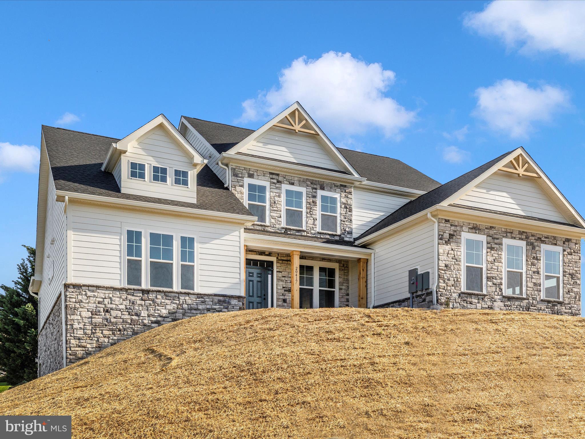 Open House Saturday May 5/17/25 1:00 pm to 3:00 pm. NEW PRICE-Builder says SELL! New Construction in sought after Pemberton subdivision! Priced BELOW recent appraisal-this impressive home boasts over 3400 square feet of luxurious living space. Situated on over an acre corner lot, this home has all the space you need for your family. You will love the views from the covered front porch. Inside you are greeted by a gorgeous open floor plan and a 2 story family room with wood burning fireplace. There is a huge office/study in the front of the home, across from a lovely open formal dining room. As an added bonus the builder used all SOLID CORE interior doors for sound control (work from home buyers will appreciate this). There is a main level Primary Suite with a tray ceiling and linear fireplace. Just off the Primary Suite is a large, light filled sitting room with French doors. To add to the Primary retreat, the Primary Bath has a large Roman Shower with 3 shower heads, to include an overhead rain shower. Step into the open concept family room and you will see how easy entertaining can be with full access to the kitchen complete with an extra long island that will easily seat four people. The kitchen has beautiful quartz counter tops, tile backsplash, and light wood cabinets with soft close hinges. There is a double wall oven and convenient pantry for all your cooking needs. The kitchen flows effortlessly into the sun filled morning room with vaulted ceiling and French doors. A laundry room and powder room complete the main level. Upstairs you will find 3 additional, generously sized bedrooms and a hallway full bath. All bedrooms have ceiling fans and large closets. One of the upstairs bedrooms has a walk in closet and en-suite bath. Move into this home with immediate equity and a builder warranty! You do not want to miss this! Call agent with any questions. *Buyer pays all transfer and recordation taxes*
**BUILDER IS PUTTING A COMPOSITE DECK ON BACK OF HOUSE WITH STAIRS TO YARD**