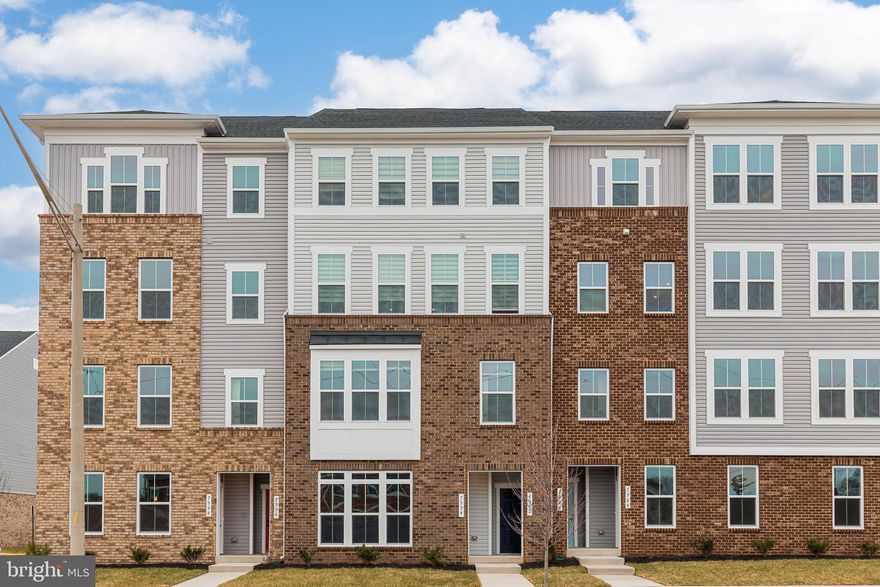 Brand New, never-lived-in rental located in a convenient Manassas community offering a functional layout and comfortable living spaces throughout. This bright and modern home features abundant natural light, LVP flooring throughout the main level, and a thoughtfully designed floor plan ideal for everyday living and entertaining. The modern kitchen offers stainless steel appliances, quartz countertops, and generous cabinet and counter space, opening seamlessly to the dining area. The upper level features three spacious bedrooms, including a primary bedroom with a walk-in closet and attached full bath, along with an upper-level bedroom that includes a private balcony. The home offers a total of three bedrooms and two and a half bathrooms. Additional features include a driveway and attached garage, as well as outdoor space for relaxation. Ideally located near shopping, dining, schools, and major commuter routes with easy access to I-66, Route 28, and public transportation. Water and trash pick up included in the rent.  Available for immediate occupancy