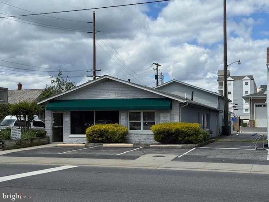 Great downtown location! Zoned Commercial C this large and gorgeous building currently has five offices/conference space, and a small warehouse space in the back of the building that is temperature controlled. Onsite parking. Tax records do not indicate actual size of building!