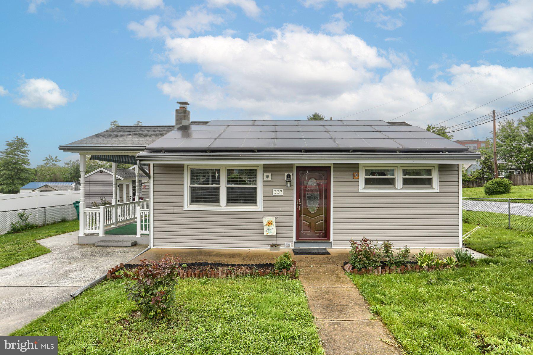 Starting out or slowing down here is the perfect home. This cute home is located on a corner lot with a completely fenced yard. Lots of updates including a whole house Generac backup generator, solar panels, dehumidifier, two exterior sheds one with electric, a large composite deck with a sunshade for privacy. There is a full basement with a waterproofing system with backup battery alarm system. Recent updates include sewer lines, oil tank, vinyl siding, roof, basement steps, some wiring, surge protectors and solar motion lights. A great home at a great price!