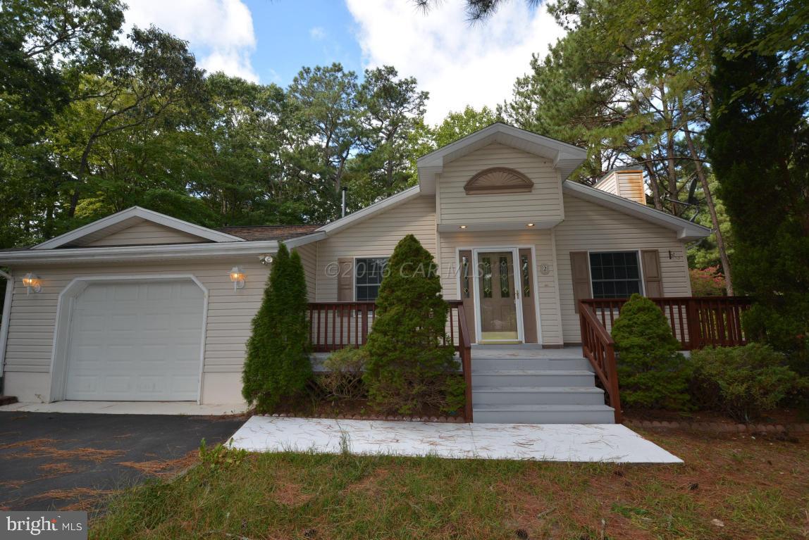 If your looking for a beautiful home in Ocean Pines come see this 3 BDR, 2 BTH ''move in ready'', open floor plan, rancher. Decks, walkway & siding have been power washed & deck & stairs painted. You see pride of ownership from the moment you take that first step on the stairs. The exterior entry way is very inviting. Open the door & walk in. Recently cleaned carpets & pointed up walls-all done so you don't have too. Very crisp & clean. The house features a family room/man cave area w/ direct access to the back deck. The master BDR has a large walkin closet, sliding glass doors to the back deck & a large master BTH w/dual sinks. Enjoy all that Ocean Pines has to offer: beach club, boat ramp, docks, golf club & course, outdoor pool & tennis. Now is the Time to Invest in the Beach Lifestyle.