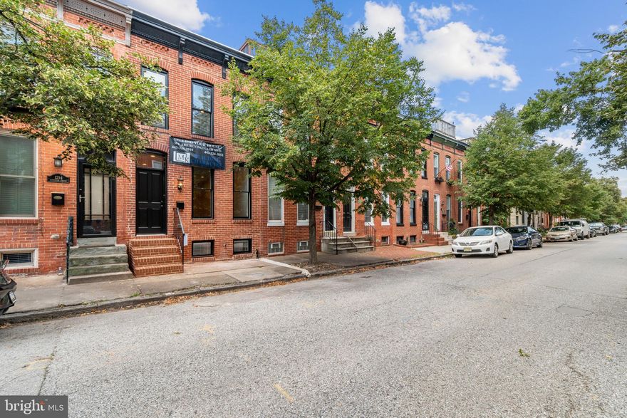 Brand New Federal Hill CHAP Renovation by Building Character with PARKING. 3 Finished Levels. The Main Level has a Large Living Room, Dining Room, Kitchen and Half Bath. The Upper Level offers 2 Bedrooms, 1 Home Office, 2 Full Baths, Hall Linen Closet and Direct Access to the Roof-Top DECK with Skyline Views. The Lower Level Includes 2 Additional Rooms, Third Full Bath, Laundry and 3 Hall Closets. All Insulation is Energy Efficient Spray Foam. Whole House Audio System. Custom Tile, Trim and Paint. And Don’t Forget the Amazing Building Character 2-Year Builder Service Warranty.