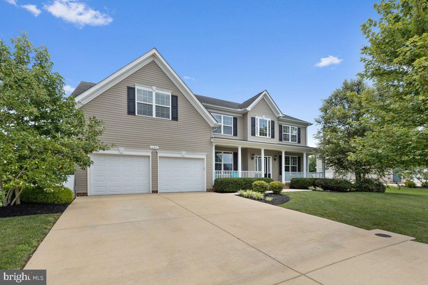 Introducing your new home in the esteemed Pembrook Subdivision, a luxurious 6 Bedroom, 3.5 Bath residence boasting over 5000 finished square feet of living space. This magnificent abode offers ample room for comfortable living and entertaining. The highlight of this exquisite property is the gourmet kitchen, which has been fully remodeled to feature High-End Stainless Steel Appliances, Double Ovens, Cooktop, Walk-In Pantry, New counter tops, new kitchen Island, and Beautiful Hardwood flooring throughout the main level. The spacious two-story family room is complete with a warm cozy fireplace and prewired for surround sound. The sunroom bump out off of the kitchen leads to a spacious deck and patio, perfect for outdoor relaxation and entertainment. The 6-foot privacy fenced back yard provides a serene and secure environment for your family and pets. Moving to the upper level, the primary suite is a sight to behold, featuring walk-in closets, a sitting area, and a primary bathroom with dual vanities, jetted tub, separate shower with multiple heads, and custom tile work throughout. Additionally, the upper level offers 3 more bedrooms and laundry facilities. The fully finished basement is a haven for entertainment, featuring a full bedroom and bathroom, wet bar, large rec room, and ample storage space. A new tankless hot water heater has been installed prior to the current sellers. This home is a true gem, and we invite you to schedule your tour today to experience the epitome of luxury living.