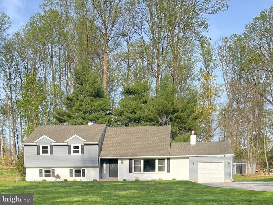 Nestled on 2 acres in the desirable Thornbury Estates, this 4-bedroom, 3.5-bathroom home offers a perfect blend of charm, space, and modern updates. With 2,877 sq. ft. of space, this property is designed for comfort and convenience.

Step inside to find an open-concept kitchen, living, and dining area,  energy-efficient windows and a cozy fireplace. A spacious three-season room sits just behind the kitchen, ideal for entertaining or unwinding after a long day.

The lower level boasts a generous laundry room, a large closet (potential for an additional bathroom), and direct access to the expansive backyard. Upstairs, three well-sized bedrooms share a full hall bath.

A few steps up, you'll discover a secluded master suite with an updated ensuite bath, newer windows, and a private roof deck overlooking the lush landscape. The unfinished attic offers endless possibilities—convert it into a home office, playroom, or extra bedroom!

Outside, enjoy mature trees, lovely landscaping, and privacy, all complemented by a updated roof, septic system, and siding. Conveniently located near major routes, country clubs, top-rated schools, and shopping/dining in West Chester and Garnet Valley.

Don’t miss this incredible opportunity—schedule your showing today!