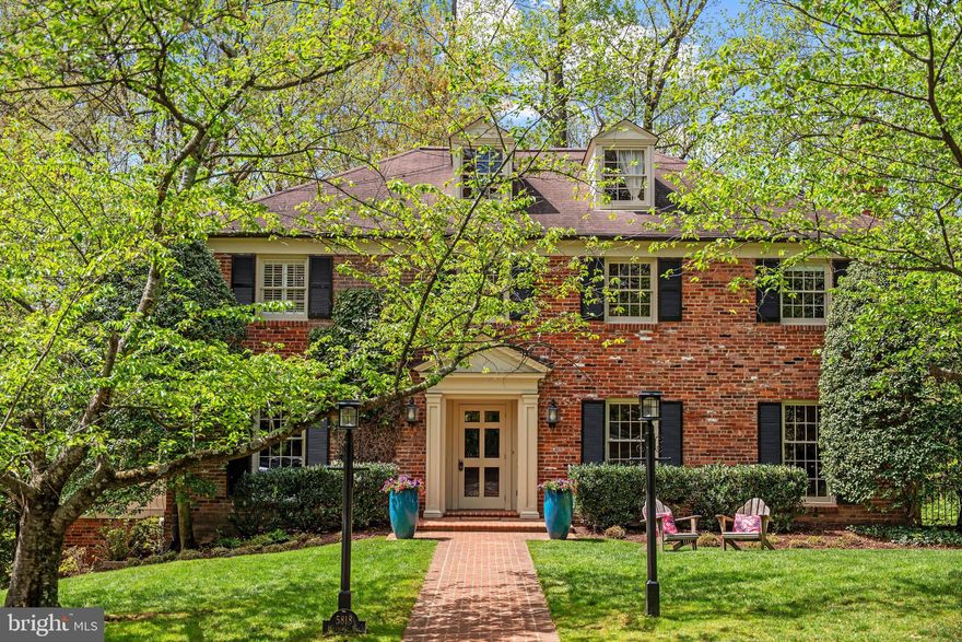 Nestled on a beautifully landscaped 1/3-acre corner lot, this gracious KENWOOD home offers rare privacy thanks to mature trees and thoughtful plantings- with multi zone irrigation. Great for nature lovers too.

Step inside to a gracious foyer:  the formal dining and living rooms to the left and right feature floor-to-ceiling windows providing natural light. The kitchen is the heart of the home, featuring a sunny breakfast area that seats six comfortably, and opens directly onto an expansive deck—ideal for grilling/dining outside. The home's flow is perfect for entertaining. A sound system sets the mood with speakers installed across all four levels, including the deck. Just off the kitchen, a powder room, sunroom with windows on three sides, and a separate cozy sitting area (with wet bar) also has double doors leading to the deck.

The  second floor owners’ suite is a true retreat, with hardwood floors, a marble bathroom, and a spacious walk-in closet room that offers great flexibility. Use the space as a sitting room, office, nursery—or even bedroom #6. There are two more bedrooms and another full bath on this level.

The lower level is a standout feature, with 10' ceilings, a cozy fireplace, and walk-out access to the backyard. It also includes an additional bedroom and full bath, laundry room, generous storage, and a deep 2-car attached garage.

Located in a beloved neighborhood known for its cherry blossom-lined streets, community social events, and a non-mandatory citizens' association with optional membership, an active list serve, and added security patrol. Kenwood events held throughout the year (the Independence Day parade, blossom party, and annual holiday party, to name a few) help people  get to know one another and feel a sense of community.

Don’t miss your chance to live in one of Chevy Chase’s most desirable enclaves.  Welcome!