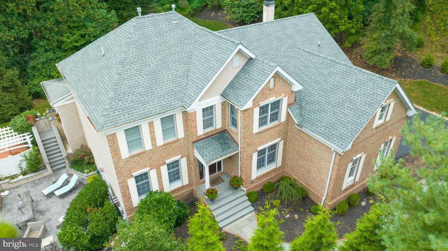 Stunning 5700+ Sq Ft 5-bedroom 4.5-bath home provides privacy on a secluded 1.6 acres along with an inviting neighborhood that offer activities which equals a true gem! Completely renovated top to bottom with meticulous attention to detail. From the upgraded hardwood floors throughout to the chef's kitchen featuring custom Wood Mode cabinetry, Subzero appliances: (combo fridge & freezer, 2 double refrigerator drawers, 2 dishwashers & ice maker) and a 300-bottle temperature-controlled wine room. New addition is part of the kitchen with office/ garden room including custom cabinets and farm sink. Off to the left you will find the beautiful European covered outdoor dining and living area flanked by Dining rm and kitchen. Open both set of French doors with surround sound music ...perfect for entertaining! This house is a true masterpiece! The living areas, including the dining room with African walnut floors and the family room with a tongue and groove vaulted ceiling, offer both elegance and comfort. The library boasts exquisite Honduran mahogany cabinets and Brazilian cherry flooring. The primary bedroom is spacious and features a renovated bathroom with luxurious marble accents( 12 types Walker Zanger Calcutta gold marble) ,Rain shower/steam shower , a therapeutic tub, and radiant heat floors. Every other bedroom and bathroom has been beautifully remodeled as well. The walk out lower level offers more living space with Media area, large gym with cork floors , 2 bedrooms & full bathroom with a steam shower. Outside, the 30x20 concrete patio, outdoor kitchen, hot tub, and stone fireplace create a peaceful and private retreat. Additional features include entire house double insulated, exterior sheathing & stucco Redon -2013, a three-car garage with tech cabinets, new pebble tech garage floor, a new roof, updated three-zone HVAC, and much more. Don't miss the chance to explore this exquisite home. Conveniently located to the Main Line and the vibrant town of Phoenixville with its array of amenities and attractions, newly renovated YMCA, Phoenixville Golf Club, Valley Forge Mountain Tennis & Swim Club, Valley Forge National Park, 6 miles to Paoli Train Station and all major arteries.(Turnpike ,202 and train to center city and New York)